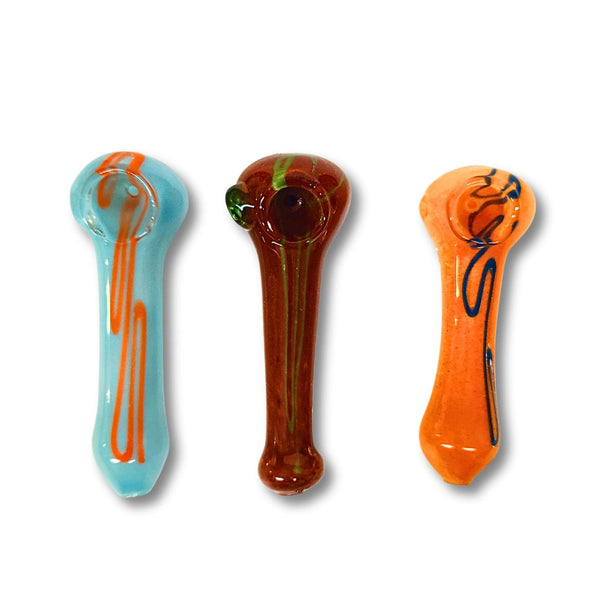 Three glass smoking pipes in different colors on a white background