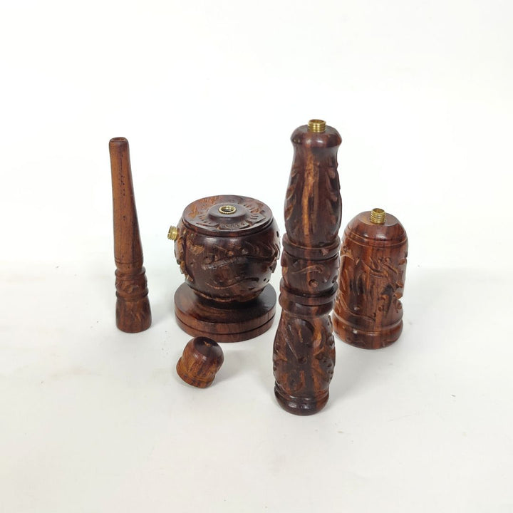 Set of wooden smoking accessories on a white background