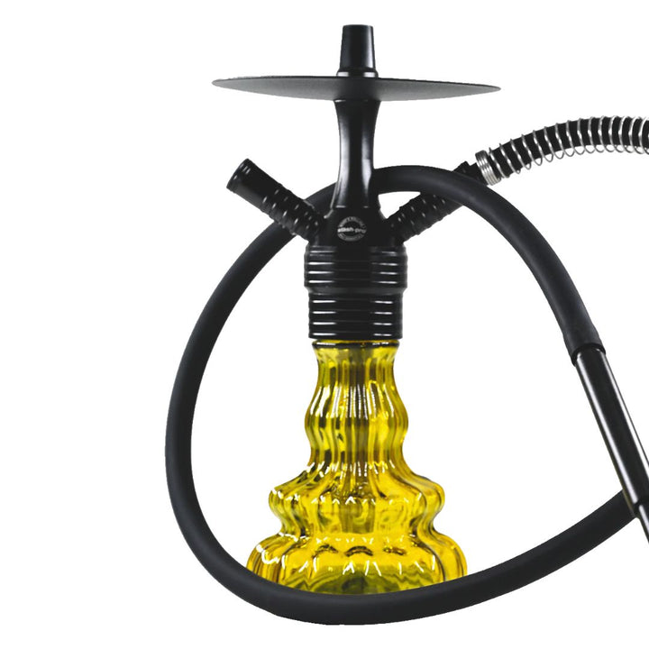 Yellow glass hookah with black hoses on a white background