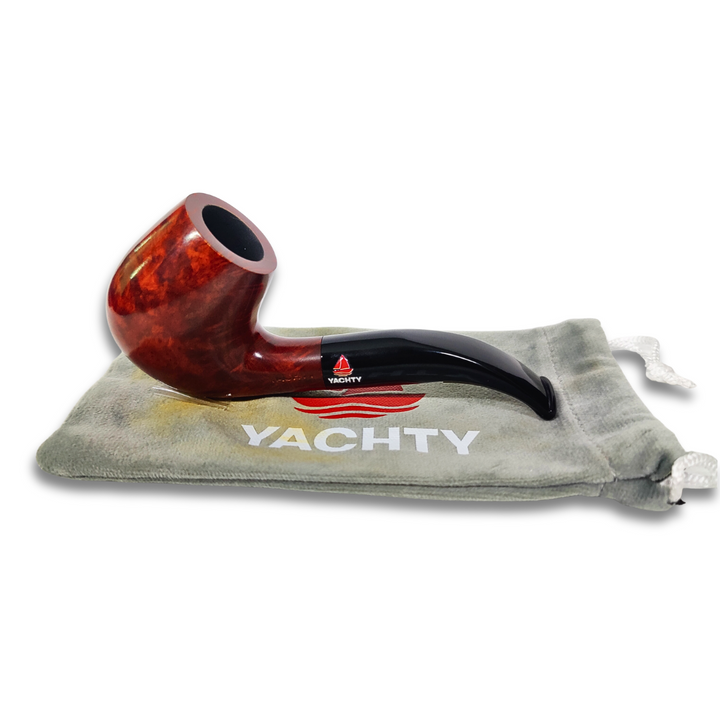 Brown and black smoking pipe with Yachty logo on a gray pouch