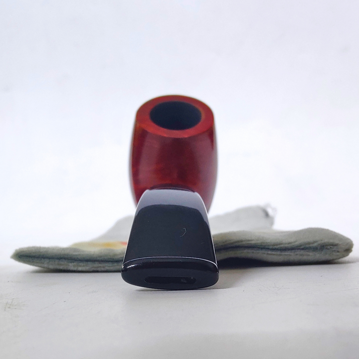 Red and black pipe on a white background