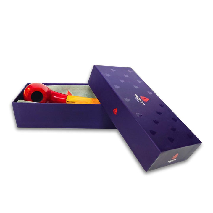 Open purple box with a red and yellow cigar pipe inside on a white background