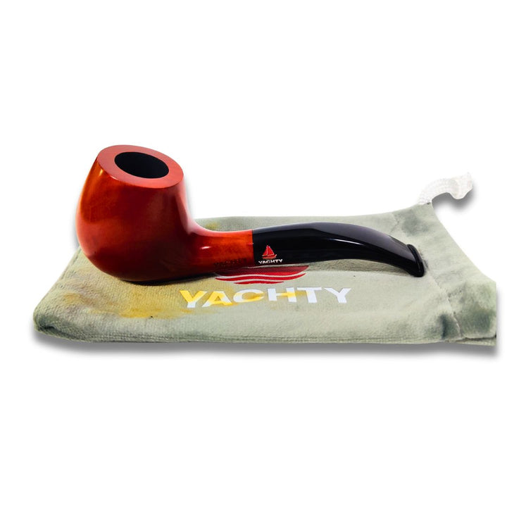 Red and black smoking pipe on a Yachty branded pouch with a white background