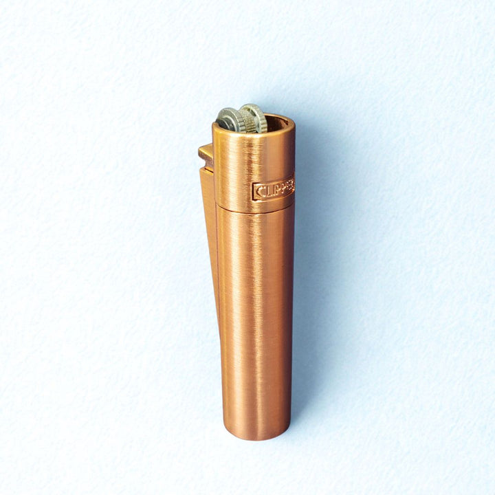 clipper rose gold matte lighter on a white background