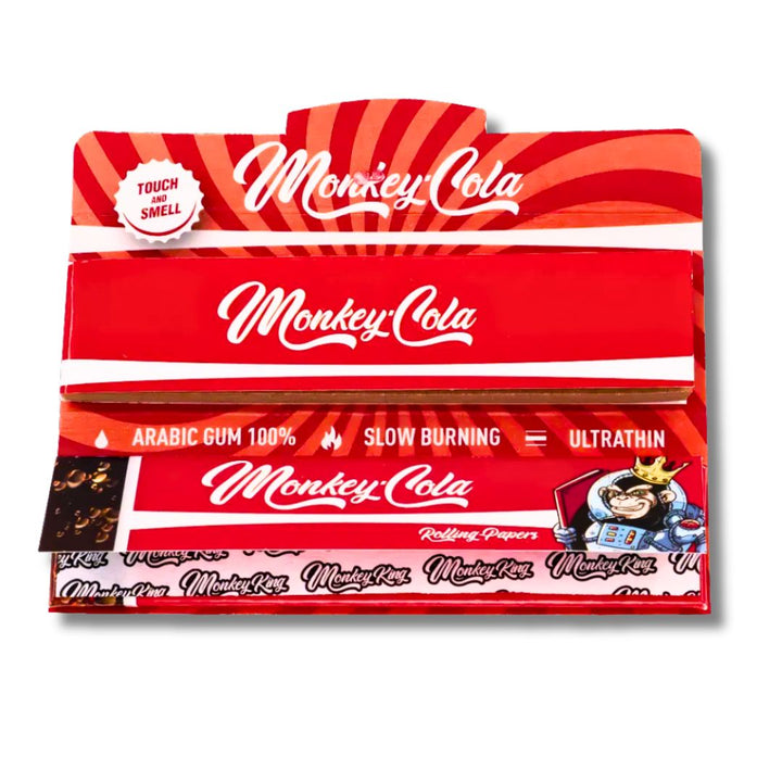 Red packaging of Monkey Cola rolling papers with branding and product details.